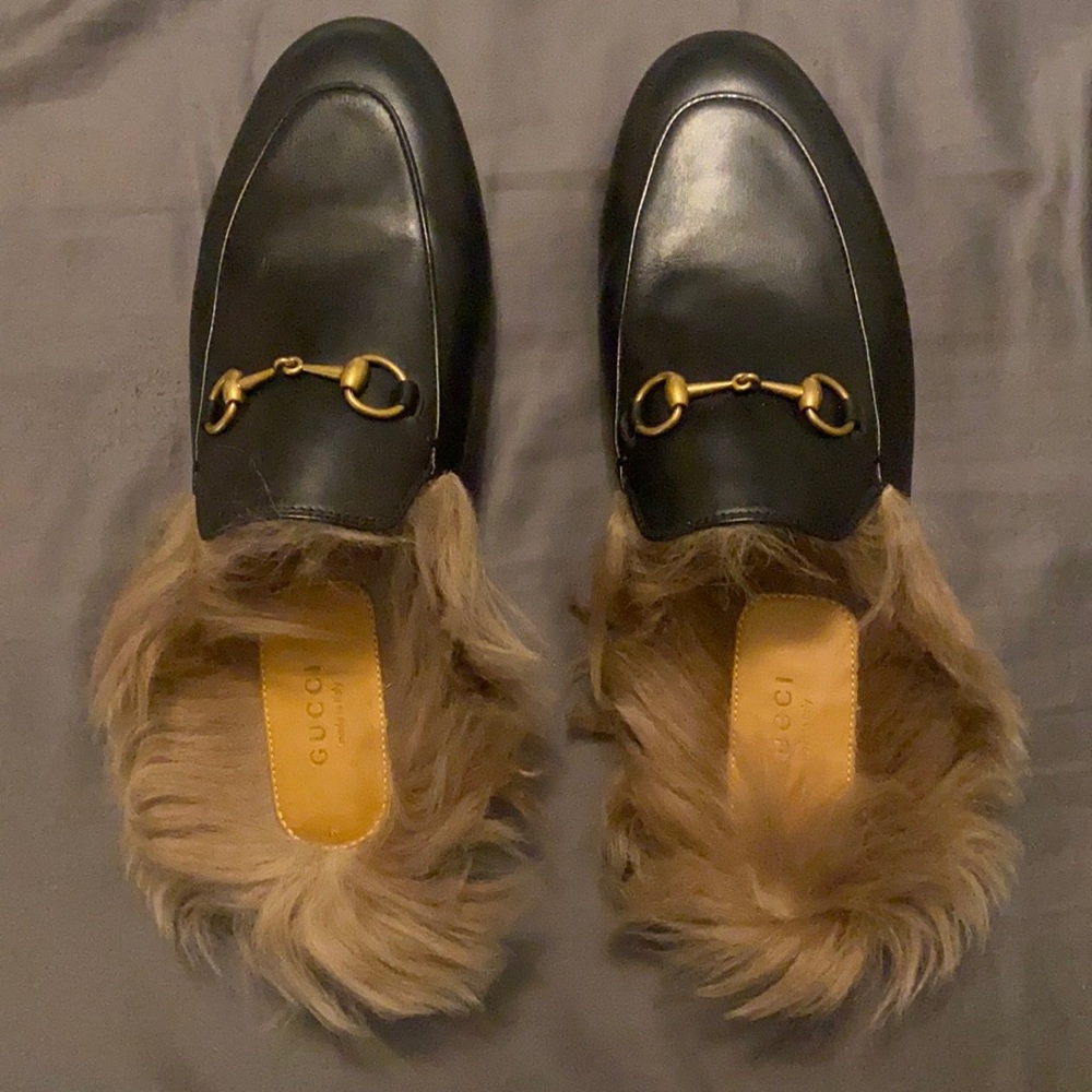 Gucci fur leather loafers.
